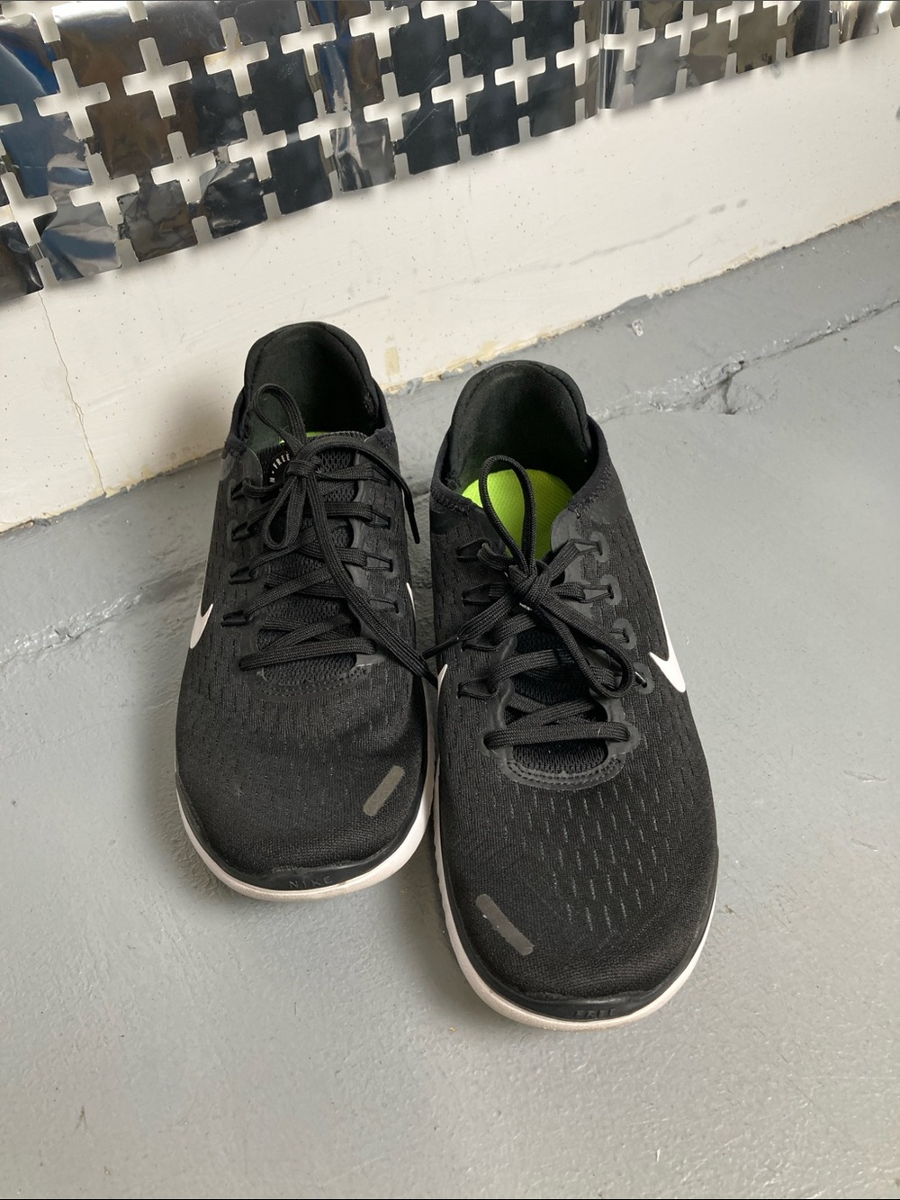 Nike Black Athletic Running Shoes with White Swoosh